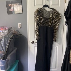 Black jumpsuit open back zippered pants gold sequence dinner party engagement